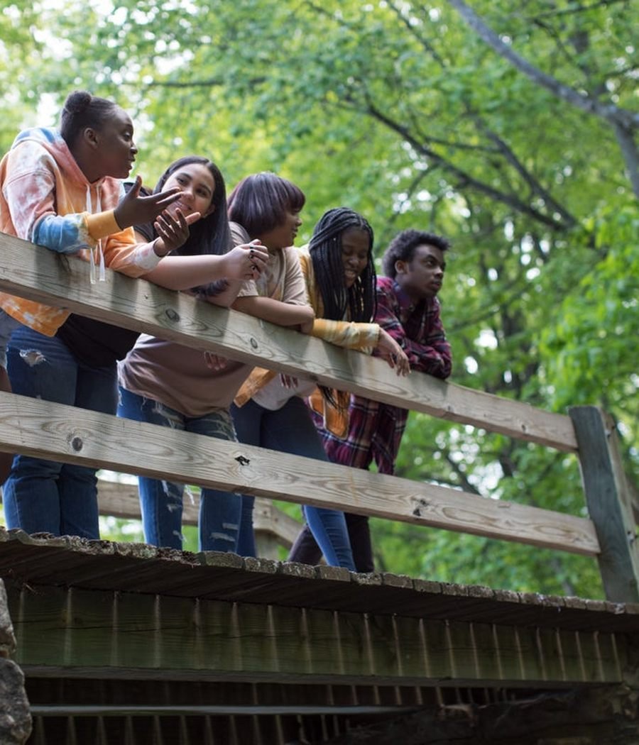 A group of women together outdoors on a walkway. Photo by a contributing Nappy photographer, CC0.